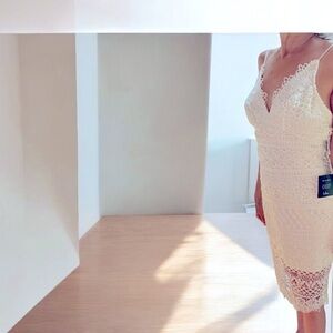 Lulu’s white satin and lace dress.  Size Small. Lace up back. New with tags.